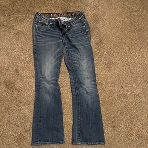 Rock Revival Blue Boot Cut Jeans with Vintage Fading